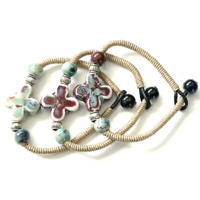 Bracelet: Glazed ceramic on cord - child or small wrist