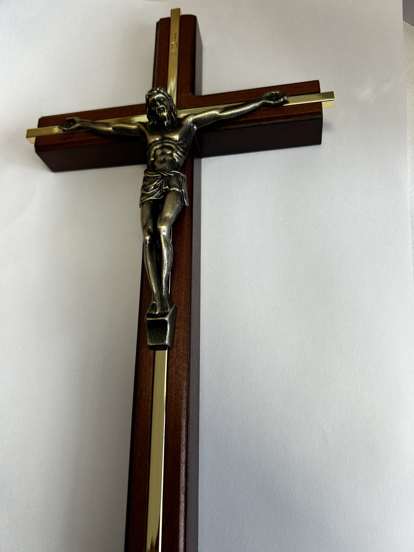 Crucifix: Metal corpus on Cedar wood, wall