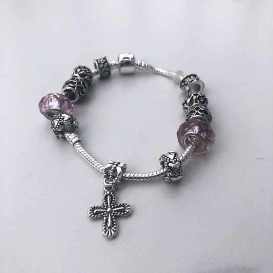 Bracelet - silver charms with cross pink